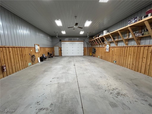 garage with wood walls