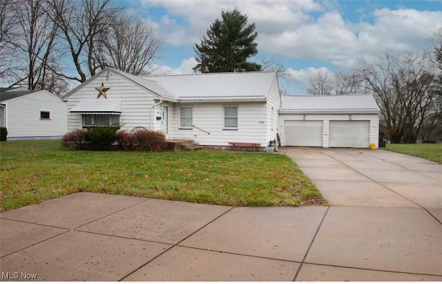 ranch-style house with a garage and a front lawn