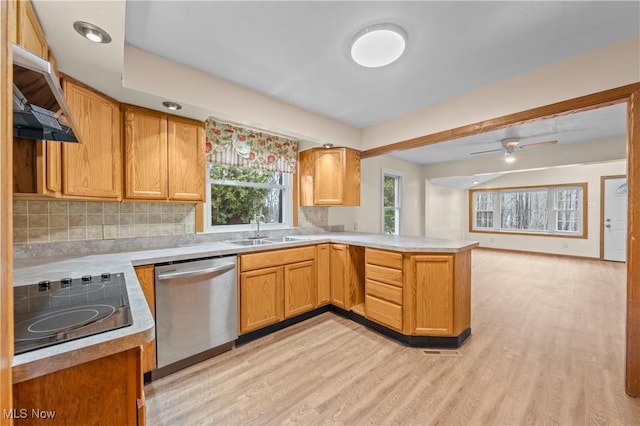 kitchen featuring stainless steel dishwasher, decorative backsplash, light wood-type flooring, black electric cooktop, and kitchen peninsula