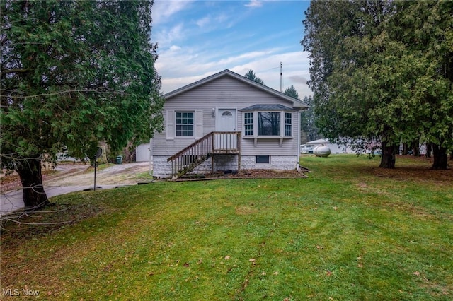 view of front of property with a front lawn