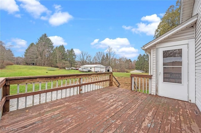 deck featuring a yard