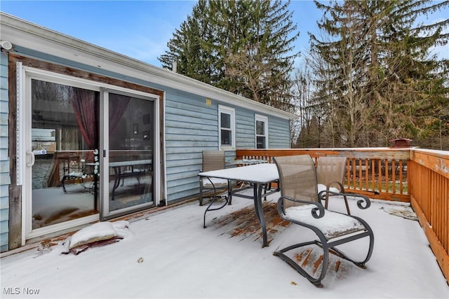 view of snow covered deck