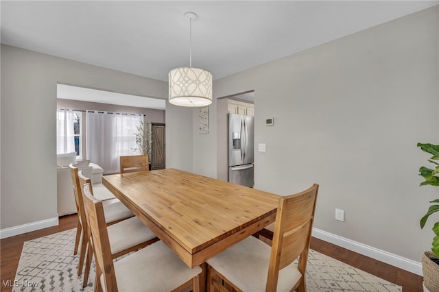 dining room featuring wood-type flooring