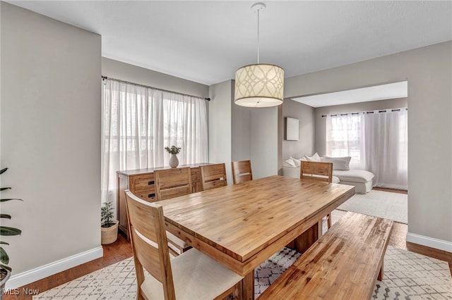 dining area with light wood-type flooring