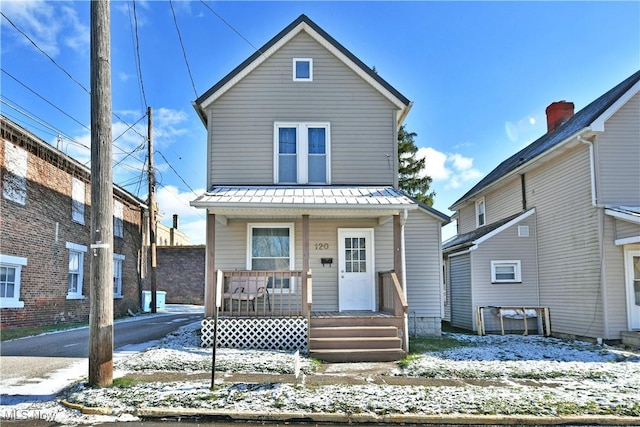 front of property featuring a porch