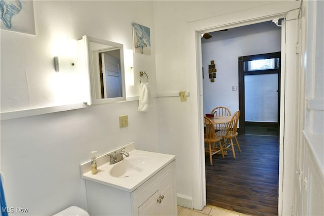 bathroom with wood-type flooring and vanity