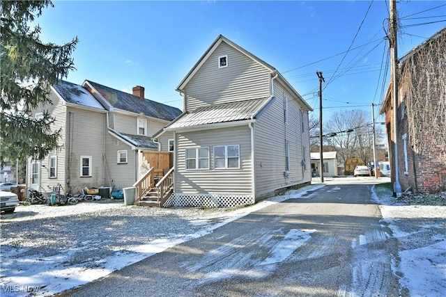 view of property with central AC unit