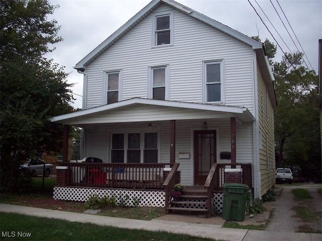 view of front of property featuring covered porch