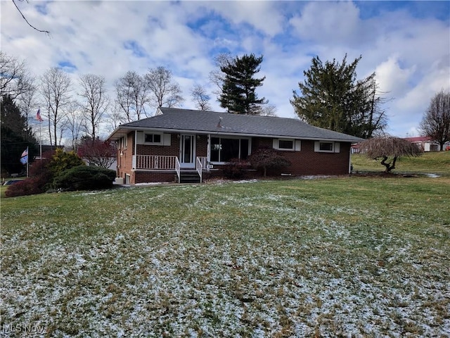 view of front of home featuring a porch and a front yard