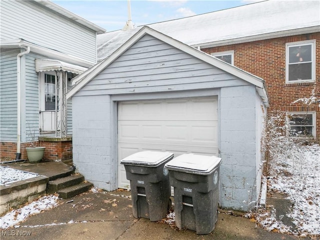 view of snow covered garage