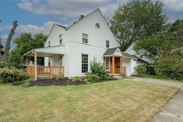 view of front of house featuring covered porch and a front yard