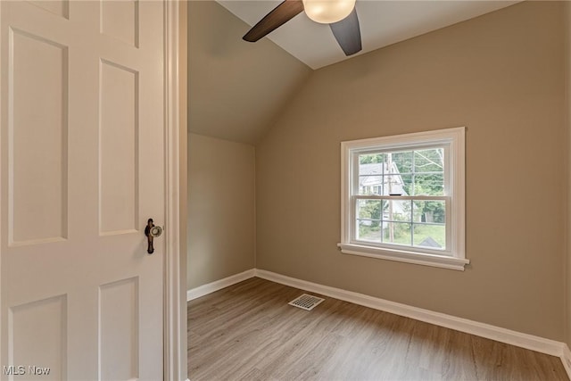 bonus room with ceiling fan, lofted ceiling, and light hardwood / wood-style flooring