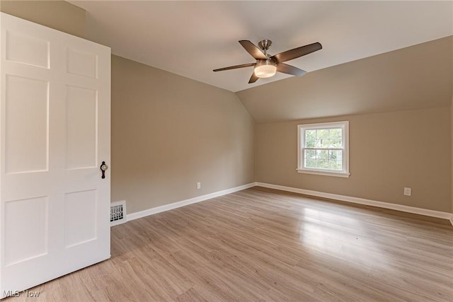 bonus room with ceiling fan, light wood-type flooring, and lofted ceiling