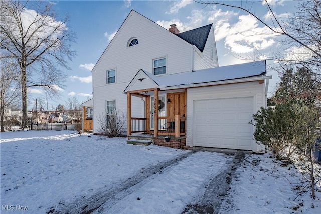 view of front of property featuring a garage