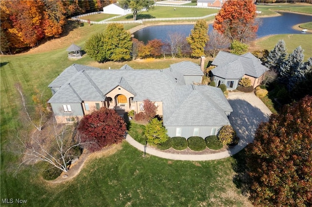 drone / aerial view featuring a water view