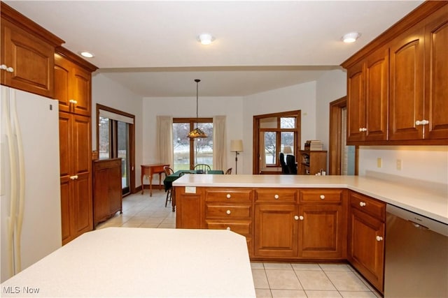 kitchen with kitchen peninsula, dishwasher, hanging light fixtures, and white refrigerator