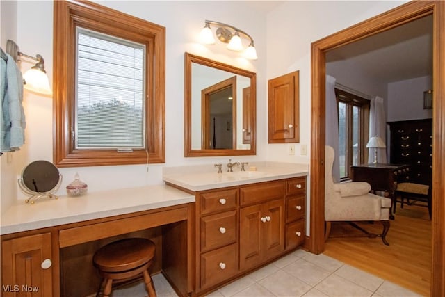 bathroom featuring hardwood / wood-style floors and vanity