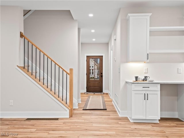 foyer entrance featuring light hardwood / wood-style floors