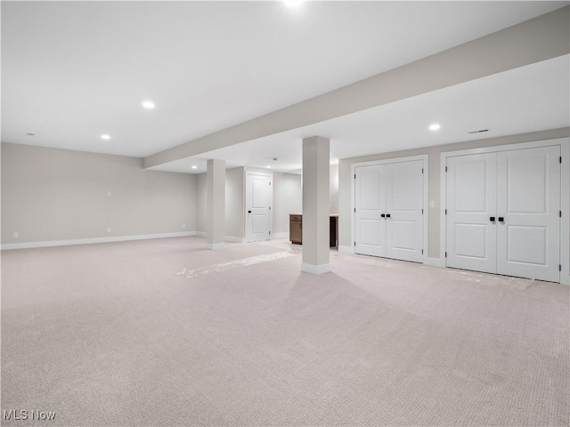 basement with light carpet