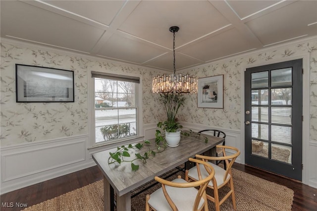 dining space with a chandelier, dark hardwood / wood-style flooring, and coffered ceiling