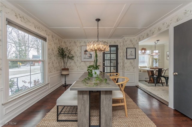 dining space with an inviting chandelier, dark wood-type flooring, and coffered ceiling