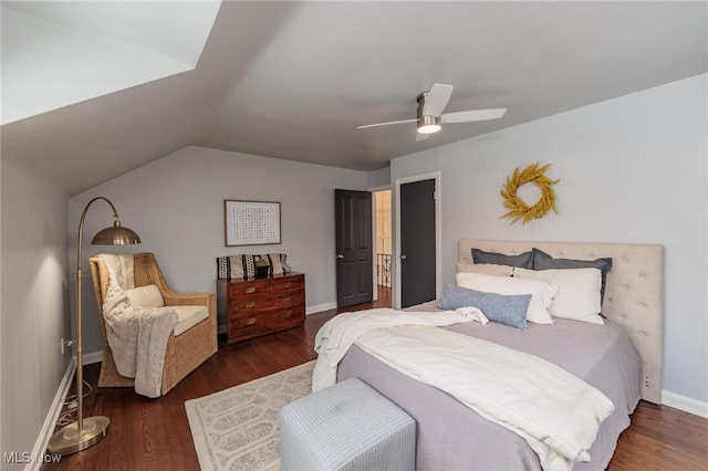 bedroom with lofted ceiling, ceiling fan, and dark hardwood / wood-style floors