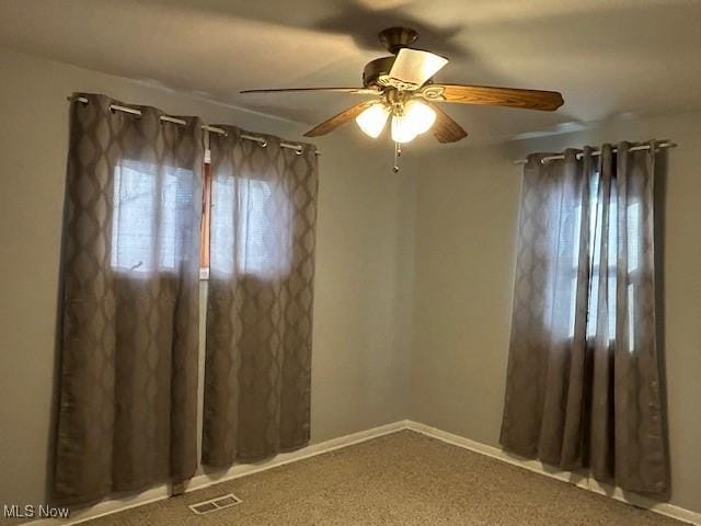 spare room featuring ceiling fan