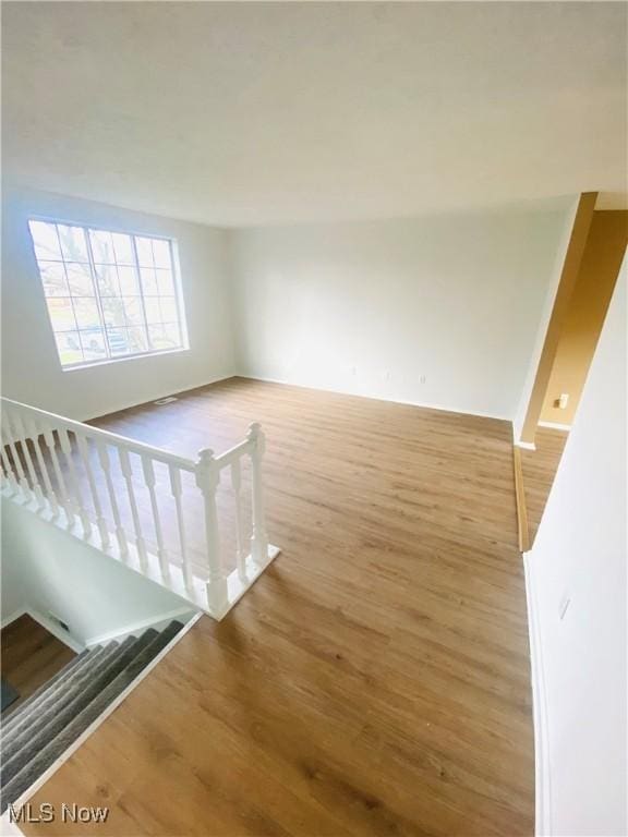 interior space with hardwood / wood-style floors