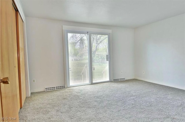 empty room featuring carpet flooring