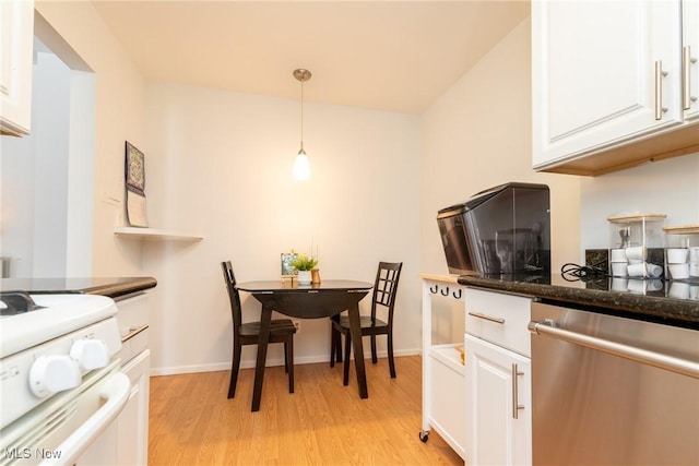 kitchen with white cabinets, hanging light fixtures, stainless steel dishwasher, light wood-type flooring, and white range oven