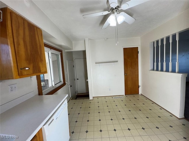 kitchen with white dishwasher and ceiling fan