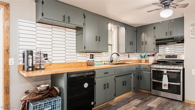 kitchen featuring butcher block counters, double oven range, sink, and dishwasher