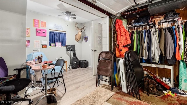 interior space with ceiling fan and light wood-type flooring