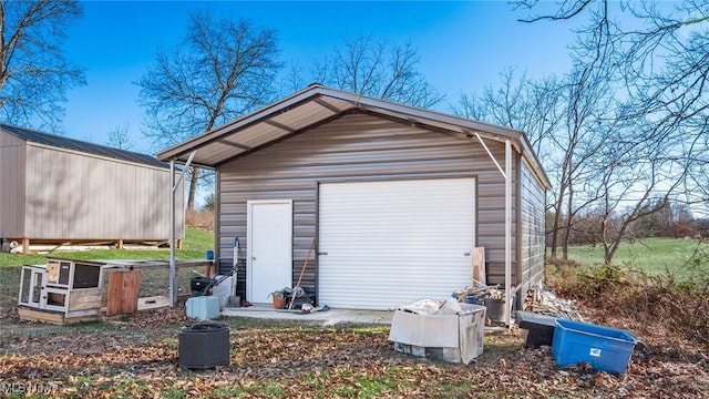 view of outbuilding featuring a garage