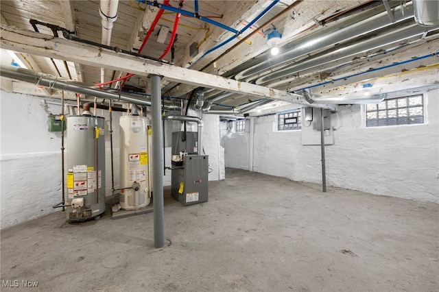 basement with heating unit and water heater