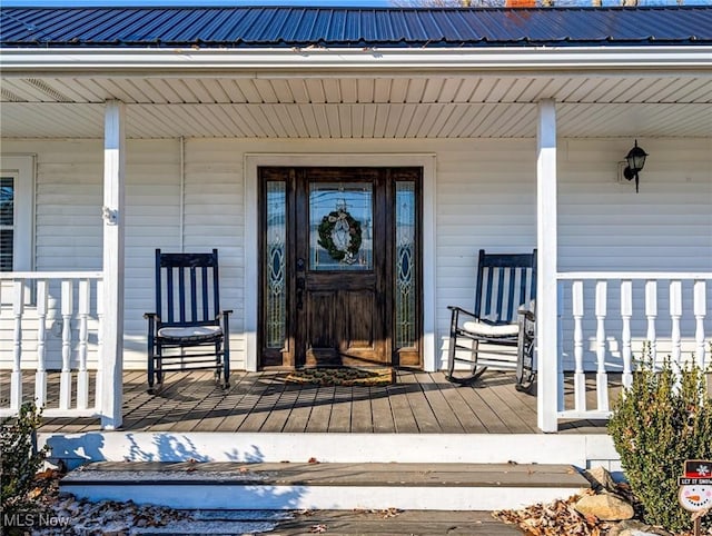 property entrance with a porch