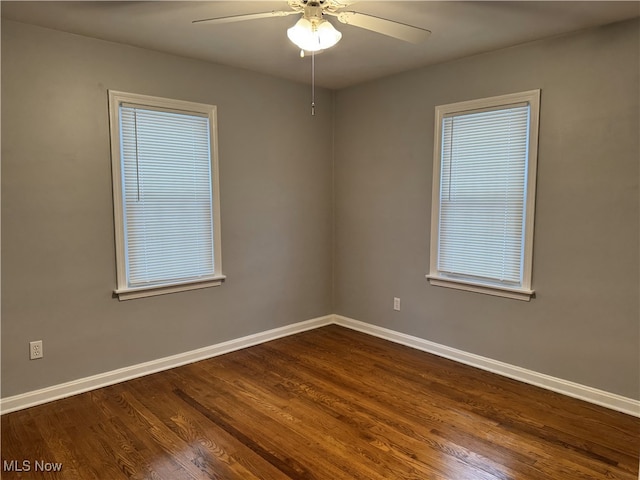 unfurnished room featuring hardwood / wood-style flooring and ceiling fan