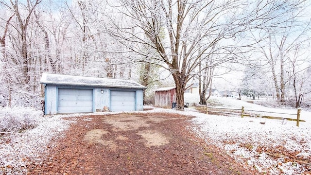 view of snow covered garage