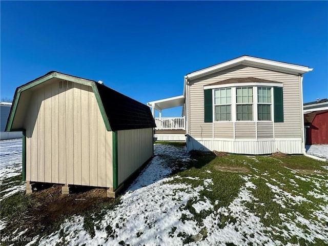 view of snow covered property