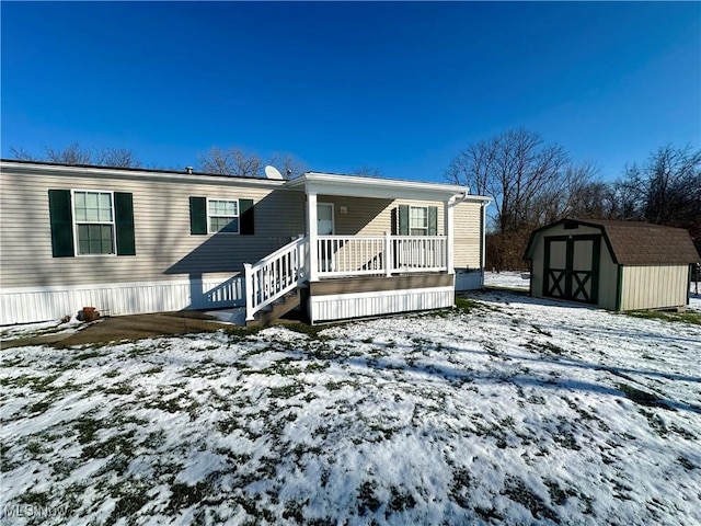 view of front of house with a shed