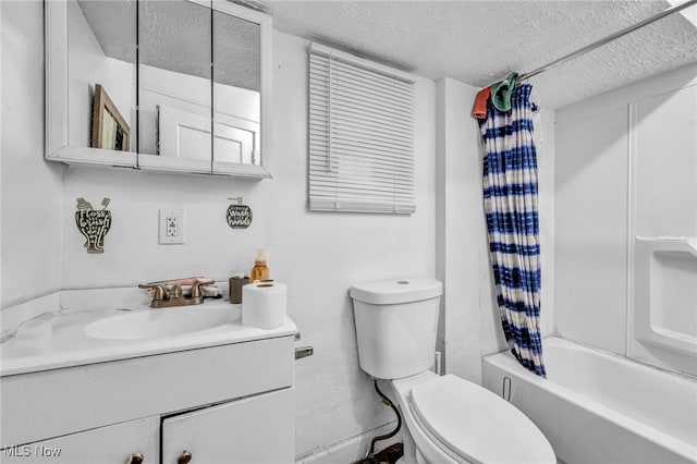 full bathroom with a textured ceiling, vanity, toilet, and shower / bath combo with shower curtain