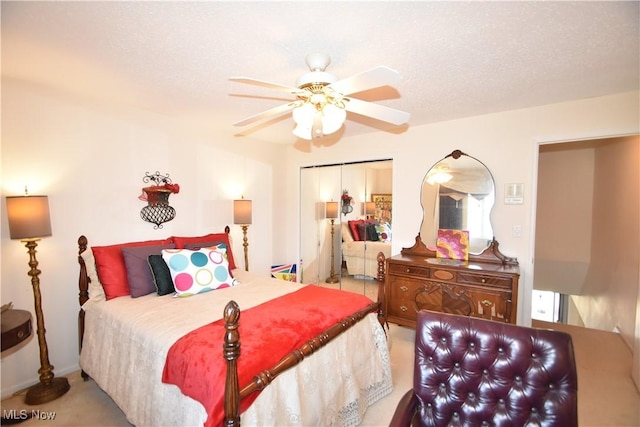 bedroom featuring a textured ceiling, a closet, and ceiling fan