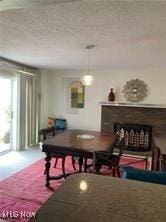 7355 W Blvd, Youngstown, OH 44512 - dining area featuring a fireplace