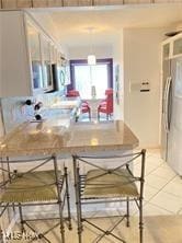 7355 W Blvd, Youngstown, OH 44512 - dining space featuring tile patterned flooring
