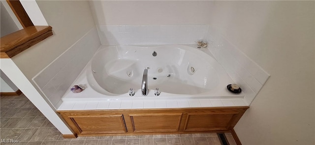 bathroom featuring tiled tub