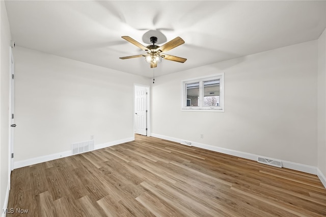 spare room with ceiling fan and light hardwood / wood-style flooring