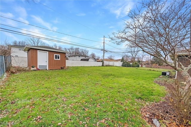 view of yard with a storage unit