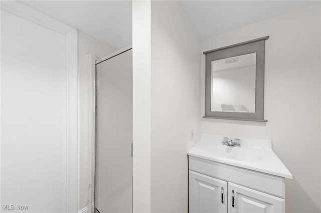 bathroom featuring vanity and walk in shower