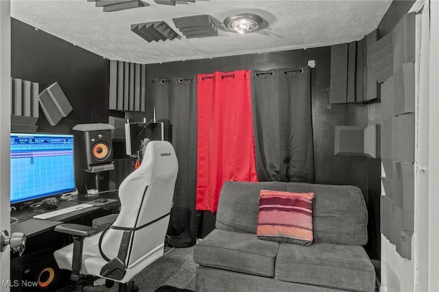 home office featuring a textured ceiling