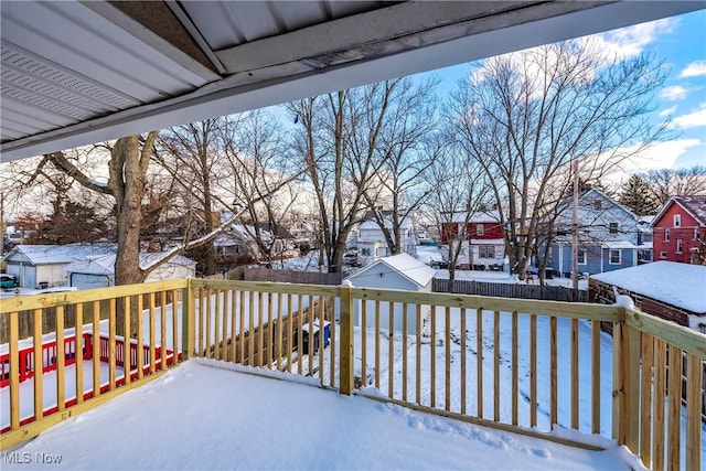 view of snow covered deck